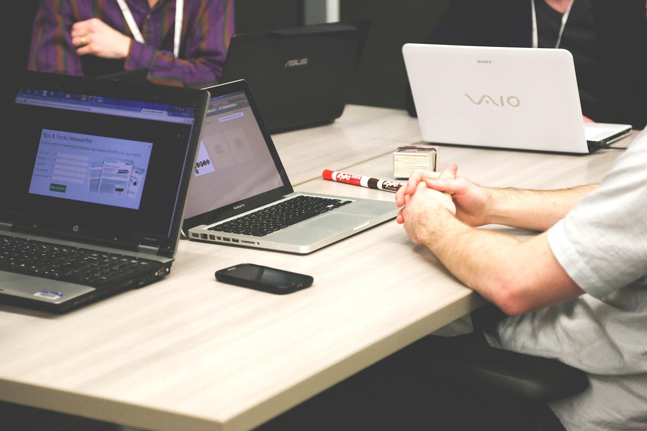 Laptops, meeting, businessmen — THC Syrup Supports Better Sleep and Evening Calm