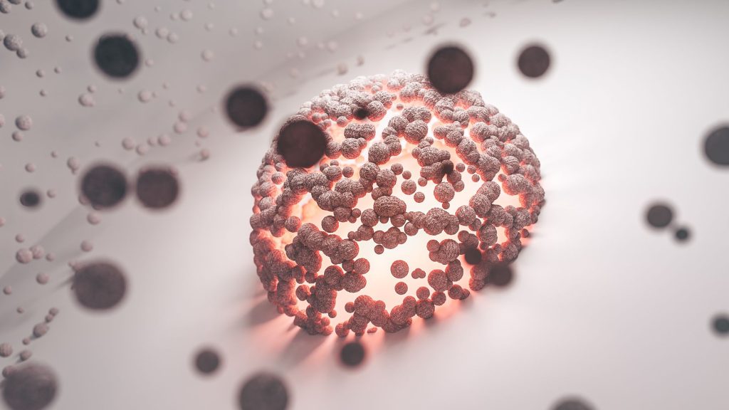 Abstract representation of stem cells in a glowing sphere surrounded by smaller particles